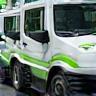 Multiple company vehicles being detailed